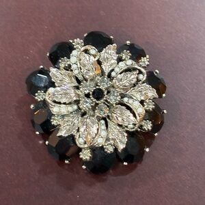 Elegant Black and Silver Floral Brooch